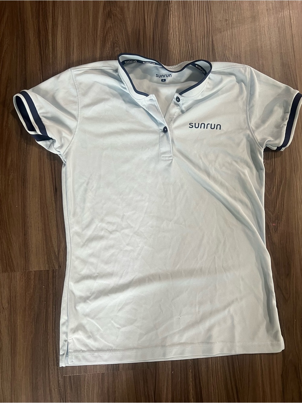 Sunrun Women's Light Blue Polo Top with Navy Trim